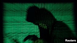 黑客发动恶意软件网络袭击模拟图。（路透社）