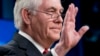 Secretary of State Rex Tillerson waves goodbye after speaking at a news conference at the State Department in Washington, March 13, 2018. President Trump fired Tillerson on Tuesday.