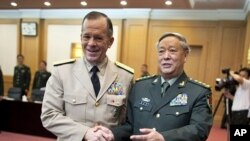 美军参谋长联席会议主席马伦与中国军队总参谋长陈炳德7月11日在北京会晤