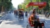Chinese tourists ride rickshaws for sightseeing in Hanoi, Vietnam, Dec. 1, 2016.